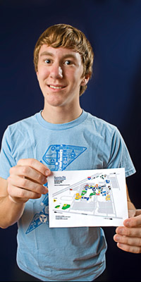 Boy holding map to theater
